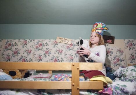 Amanda Lafferty spends time in her bedroom where she also shares the space with six of her sisters.The Lafferty family are a unique family of nine children, going against the trend of having one or two children in Canada. Photo courtesy Hannah Yoon