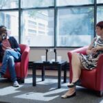 Ugandan director Kamoga Hassan discusses his film, “Outed: The Painful Reality,” with journalist and queer media instructor Andrea Houston. Photo courtesy Jessica Ross.