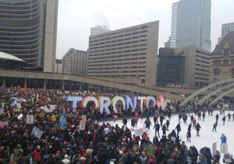 The Toronto Women's March on Washington assembles in Nathan Phillips Square. Image courtesy H.G. Watson.