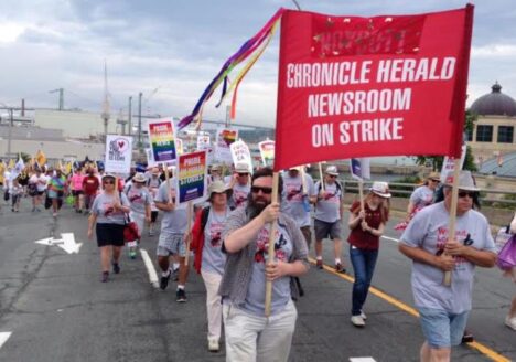 Long road: Chronicle Herald strikers at a Halifax pride parade back in June. Photo courtesy Tim Krochak.