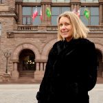 Allison Smith stands outside Queen's Park