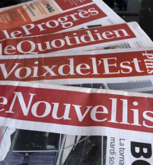A selection of newspapers owned by Groupe Capitales Medias (GCM) are pictured in Montreal on August 19, 2019