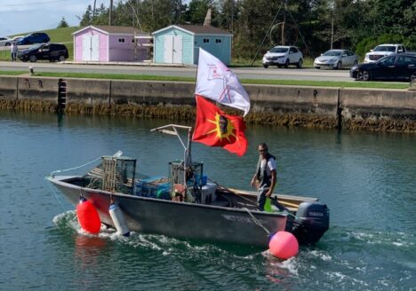 Craig Doucette heads out on to the St. Peter’s Bay to set traps, as he asserts his treaty rights under the Potlotek First Nation’s moderate livelihood fishery plan