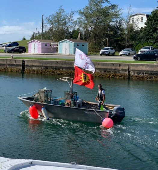 Craig Doucette heads out on to the St. Peter’s Bay to set traps, as he asserts his treaty rights under the Potlotek First Nation’s moderate livelihood fishery plan