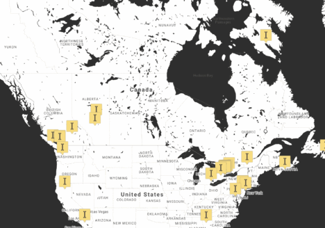 Black and white map of Canada and the United States with 37 yellow markers showing the location of Indiegraf publishers.
