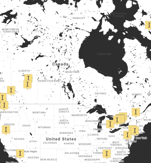 Black and white map of Canada and the United States with 37 yellow markers showing the location of Indiegraf publishers.