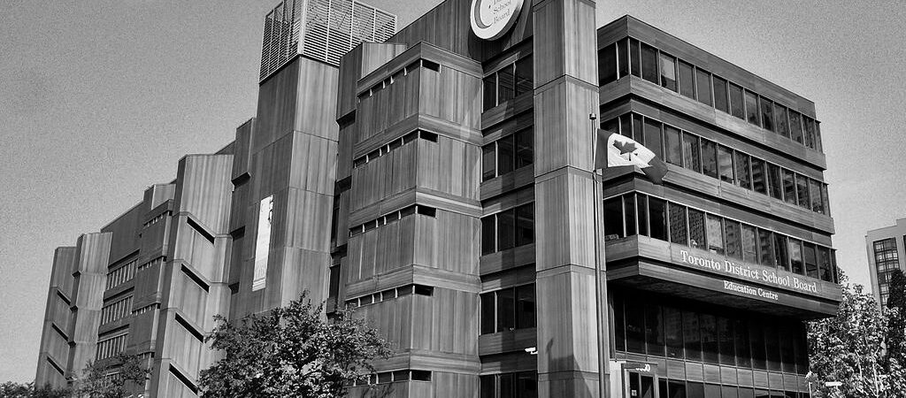 Exterior of Toronto District School Board Education Centre. Photo in black and white