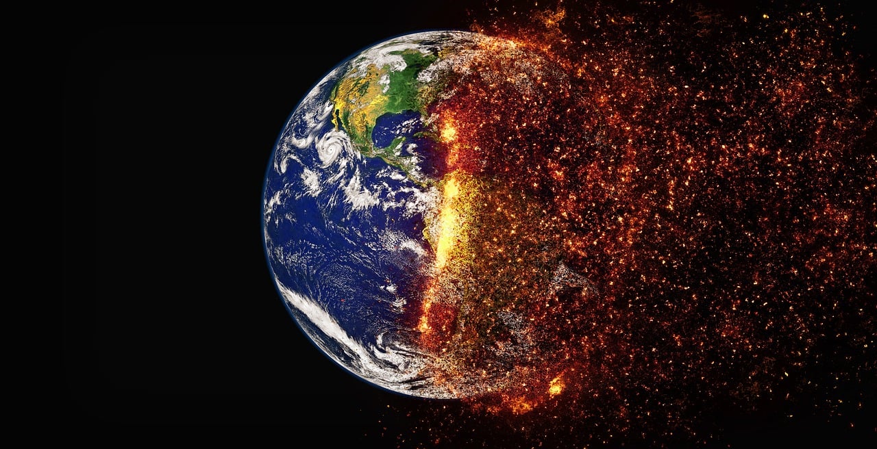 In this image the earth is in the centre and half of it is on fire. This picture depicts the impact of global warming in a visual way.